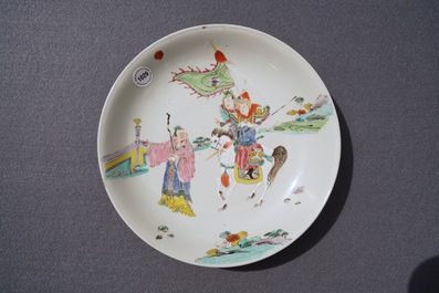 A Chinese famille rose dish with warriors on horseback, Yongzheng